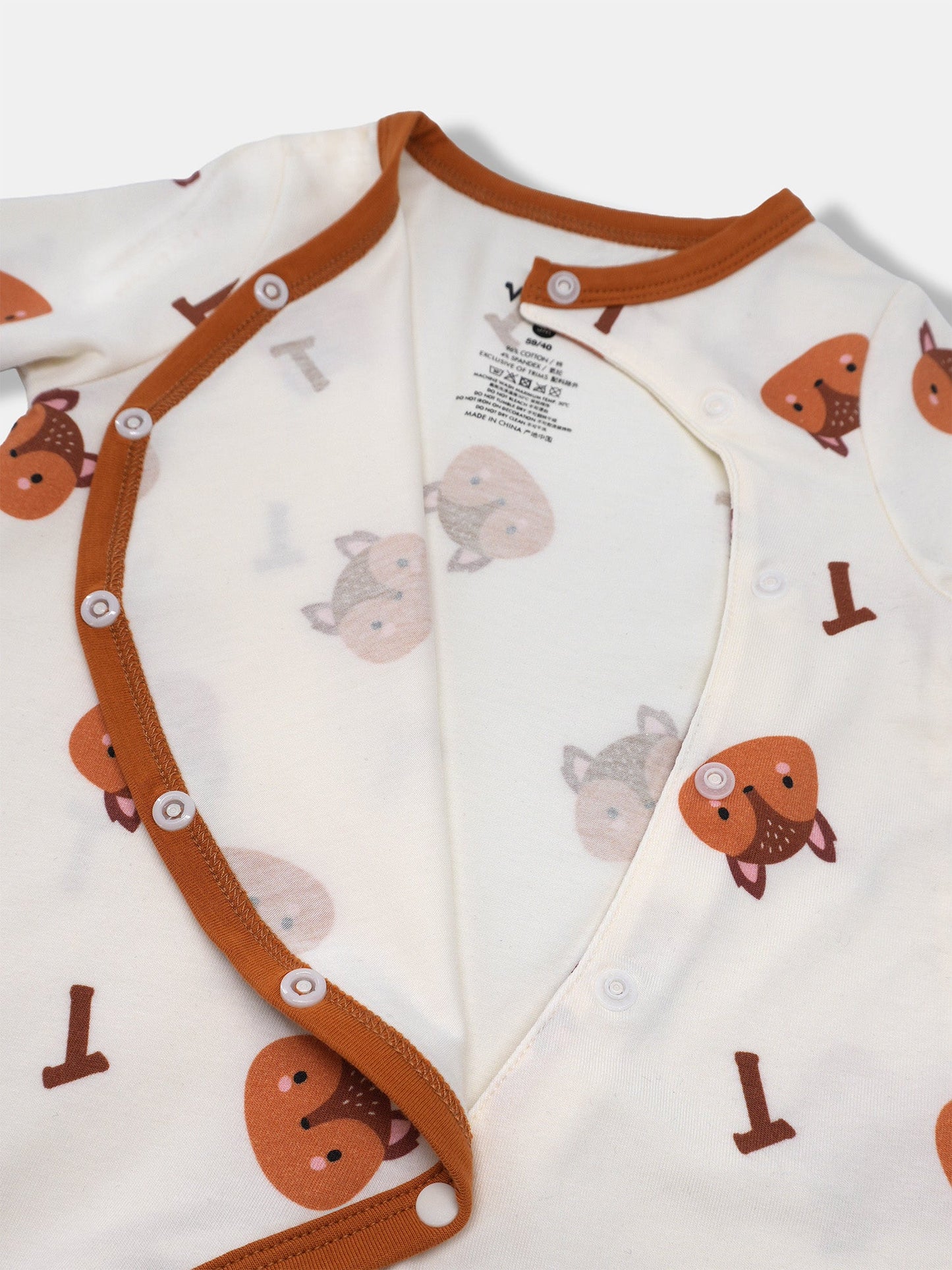 Baby's Romper And Bib Set