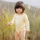 Vauva BBNS - Organic Cotton White/Light Yellow Bodysuits (2-pack) model image front