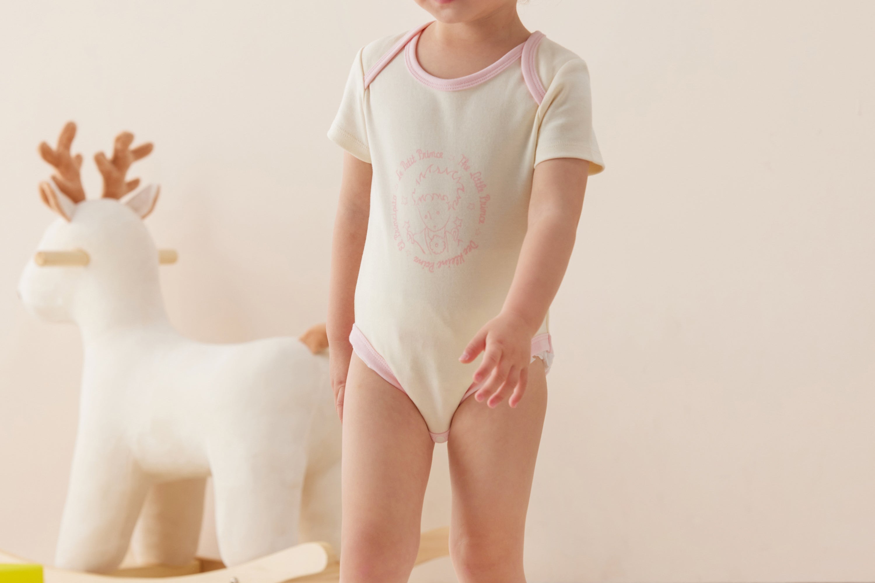 Vauva x Le Petit Prince - Baby Logo Print Longsleeve Bodysuit (Pink) model front